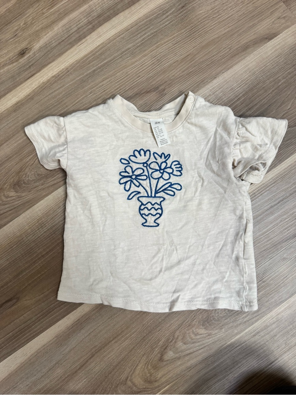 H&M Cream Tee with Blue Floral Vase Embroidery